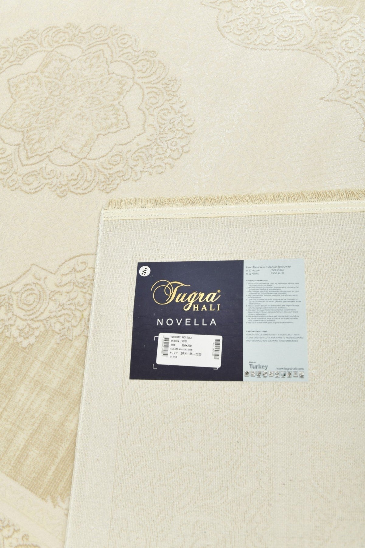 Novella Valnötsskum – Klassisk ornamentik i varm beige ton