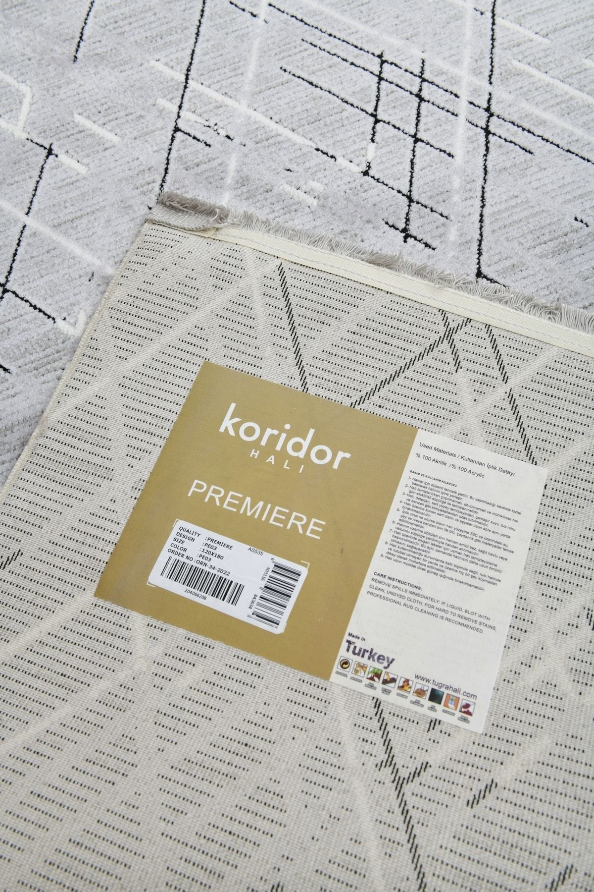 Premiere Nova - Grafisk elegans i grå toner – en modern matta som lyfter varje rum.